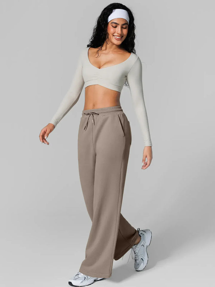 A model wearing a BRXL® Athleisure Drawstring Waist  Wide Leg Sweatpants in