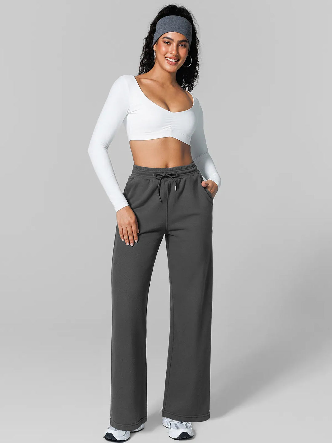 A model wearing a BRXL® Athleisure Drawstring Waist  Wide Leg Sweatpants in