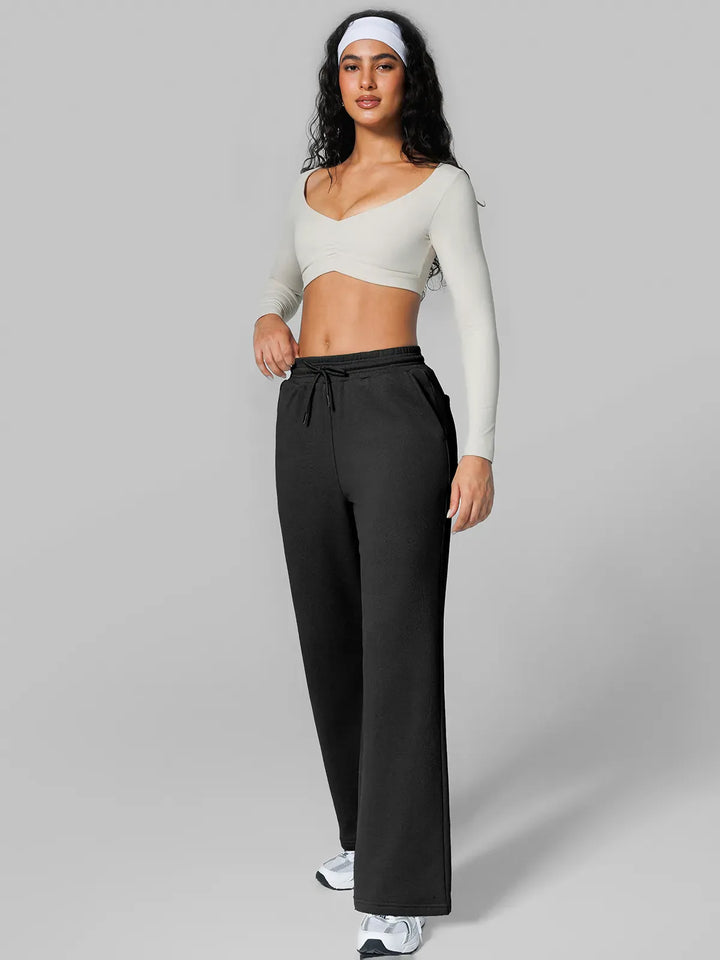 A model wearing a BRXL® Athleisure Drawstring Waist  Wide Leg Sweatpants in