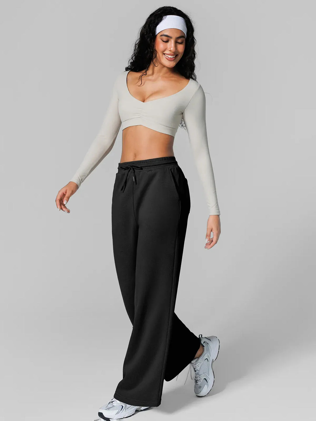 A model wearing a BRXL® Athleisure Drawstring Waist  Wide Leg Sweatpants in