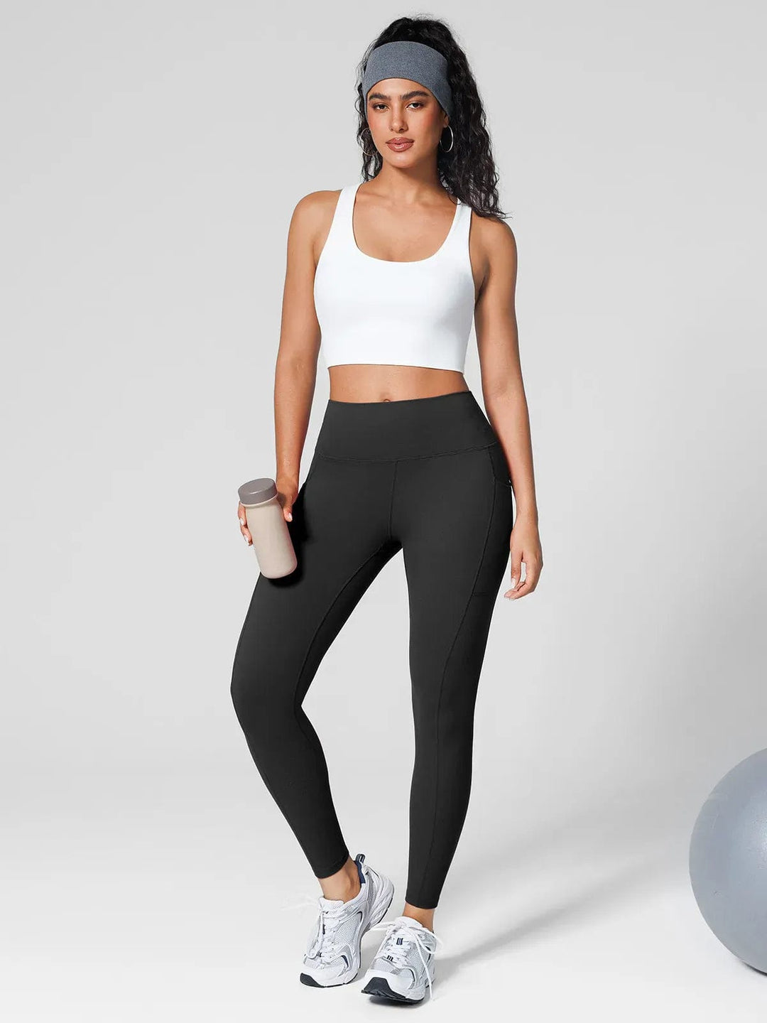 A model wearing a BRXL® Athleisure Four Pockets Cropped Jacket,One Size Fits Most Sporty High-Waisted Leggings in
