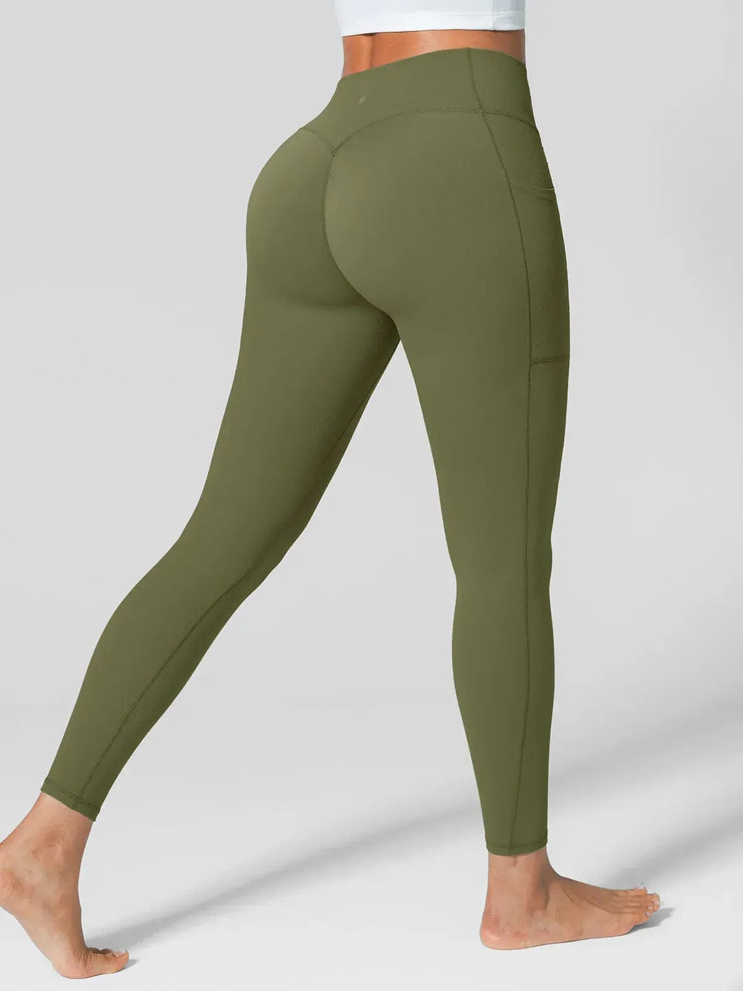 A model wearing a BRXL® Athleisure Four Pockets Cropped Jacket,One Size Fits Most Sporty High-Waisted Leggings in