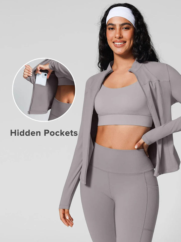 A model wearing a BRXL® Athleisure Four Pockets Cropped Jacket,One Size Fits Most Sporty High-Waisted Leggings in