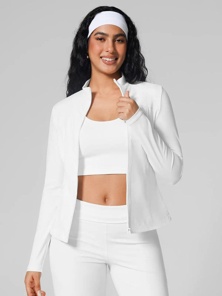 A model wearing a BRXL® Athleisure Four Pockets Cropped Jacket,One Size Fits Most Sporty High-Waisted Leggings in Jacket / White / XS