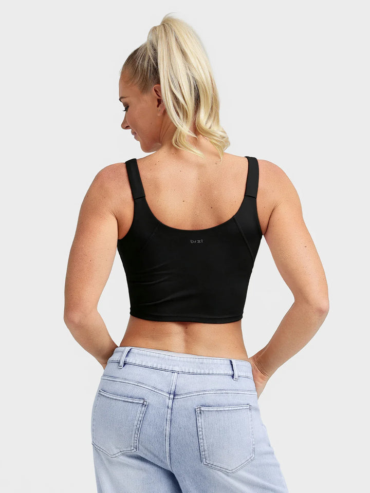 A model wearing a BRXL® B R X L™ Adjustable Strap U-Neck Cropped Tank Top