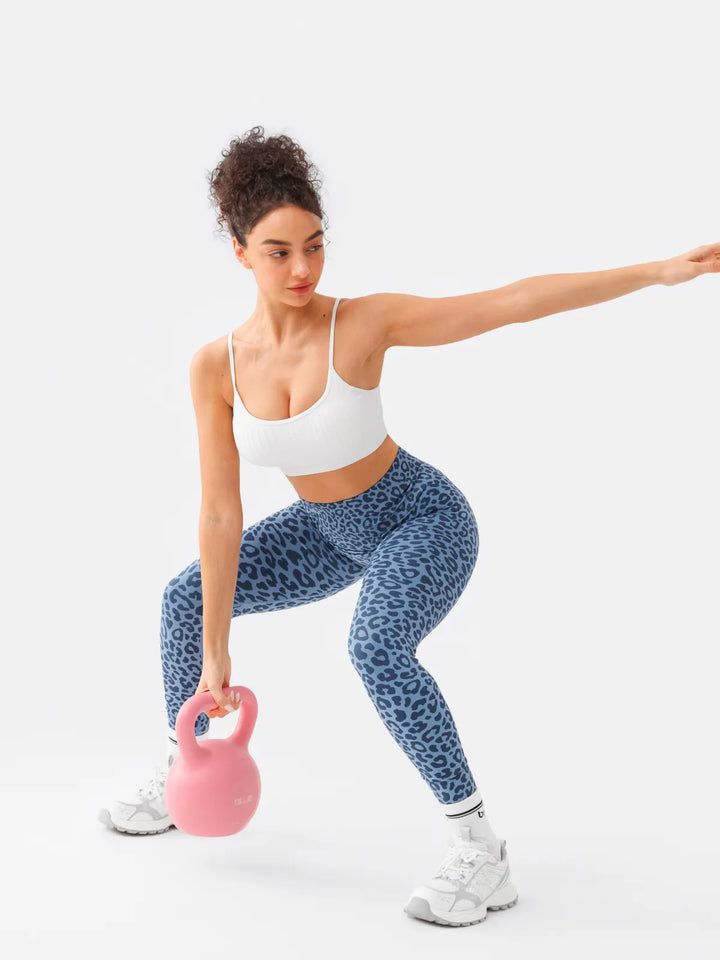 A model wearing a BRXL® B R X L™ Scrunch Butt Lifting Tummy Control High Waist Workout Leggings