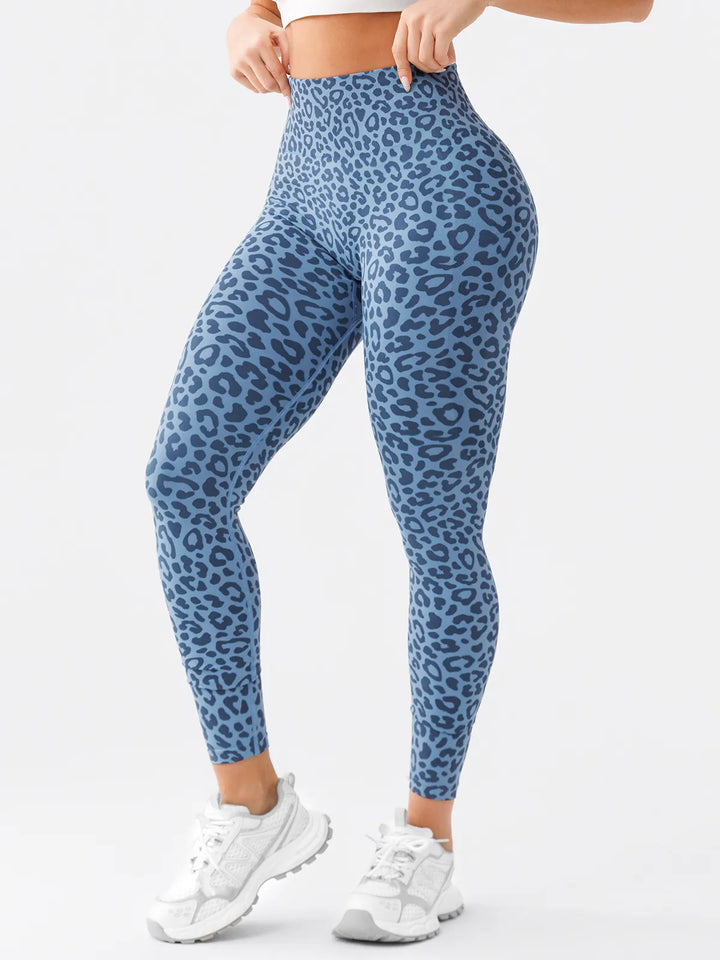 A model wearing a BRXL® B R X L™ Scrunch Butt Lifting Tummy Control High Waist Workout Leggings