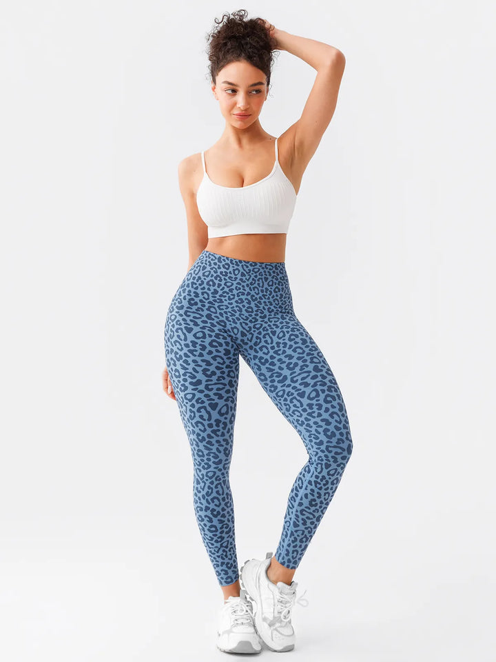 A model wearing a BRXL® B R X L™ Scrunch Butt Lifting Tummy Control High Waist Workout Leggings