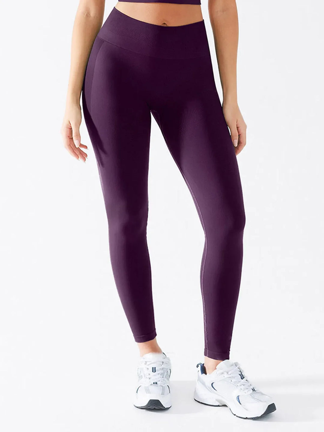 A model wearing a BRXL® B R X L™ Scrunch Butt Lifting Tummy Control High Waist Workout Leggings