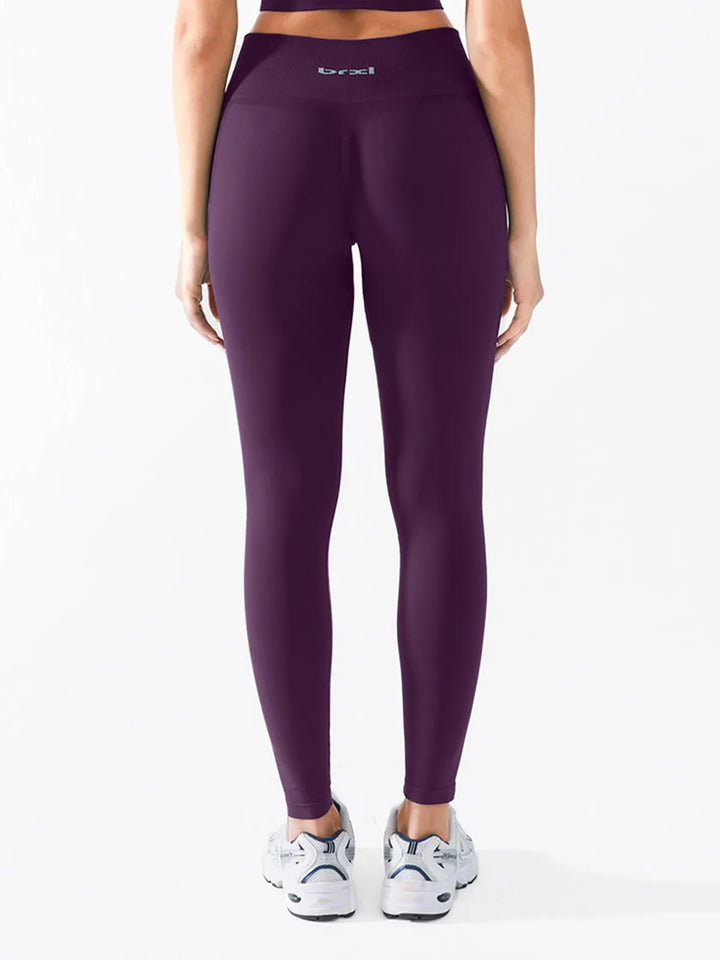 A model wearing a BRXL® B R X L™ Scrunch Butt Lifting Tummy Control High Waist Workout Leggings