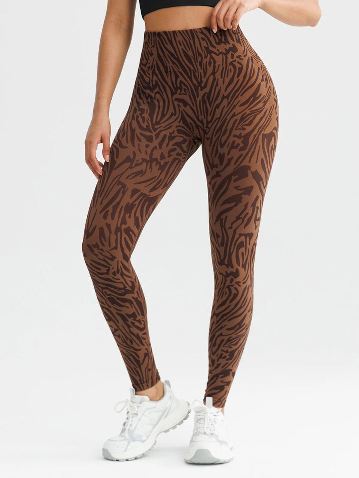 A model wearing a BRXL® B R X L™ Scrunch Butt Lifting Tummy Control High Waist Workout Leggings