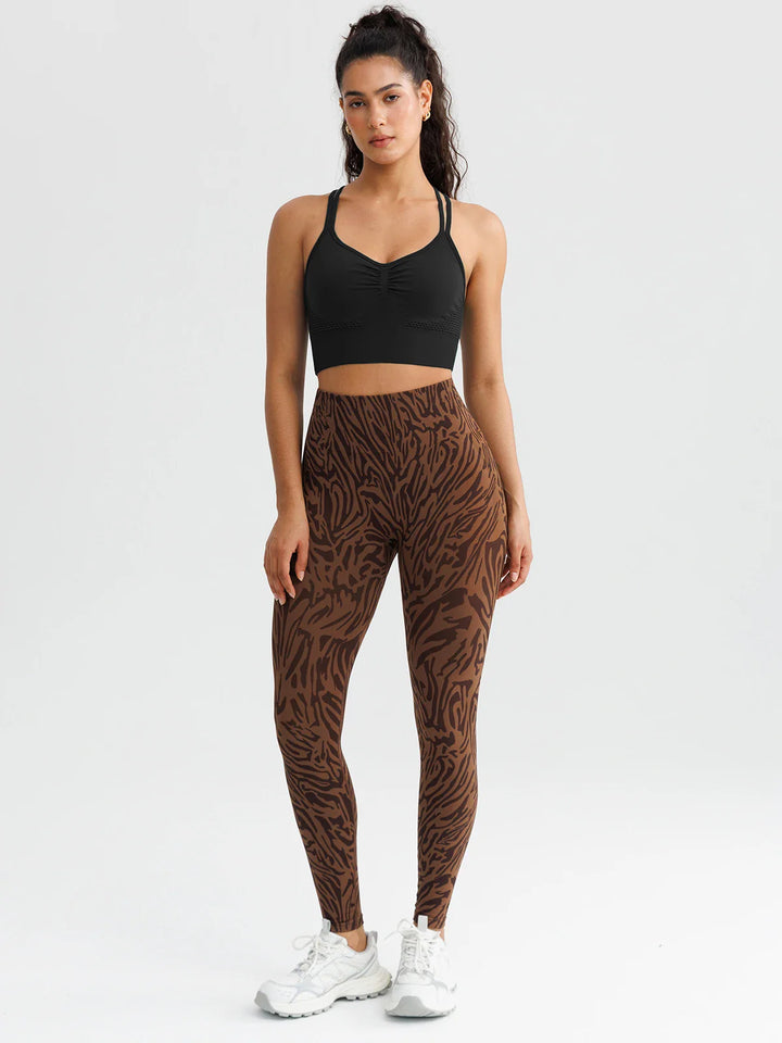 A model wearing a BRXL® B R X L™ Scrunch Butt Lifting Tummy Control High Waist Workout Leggings