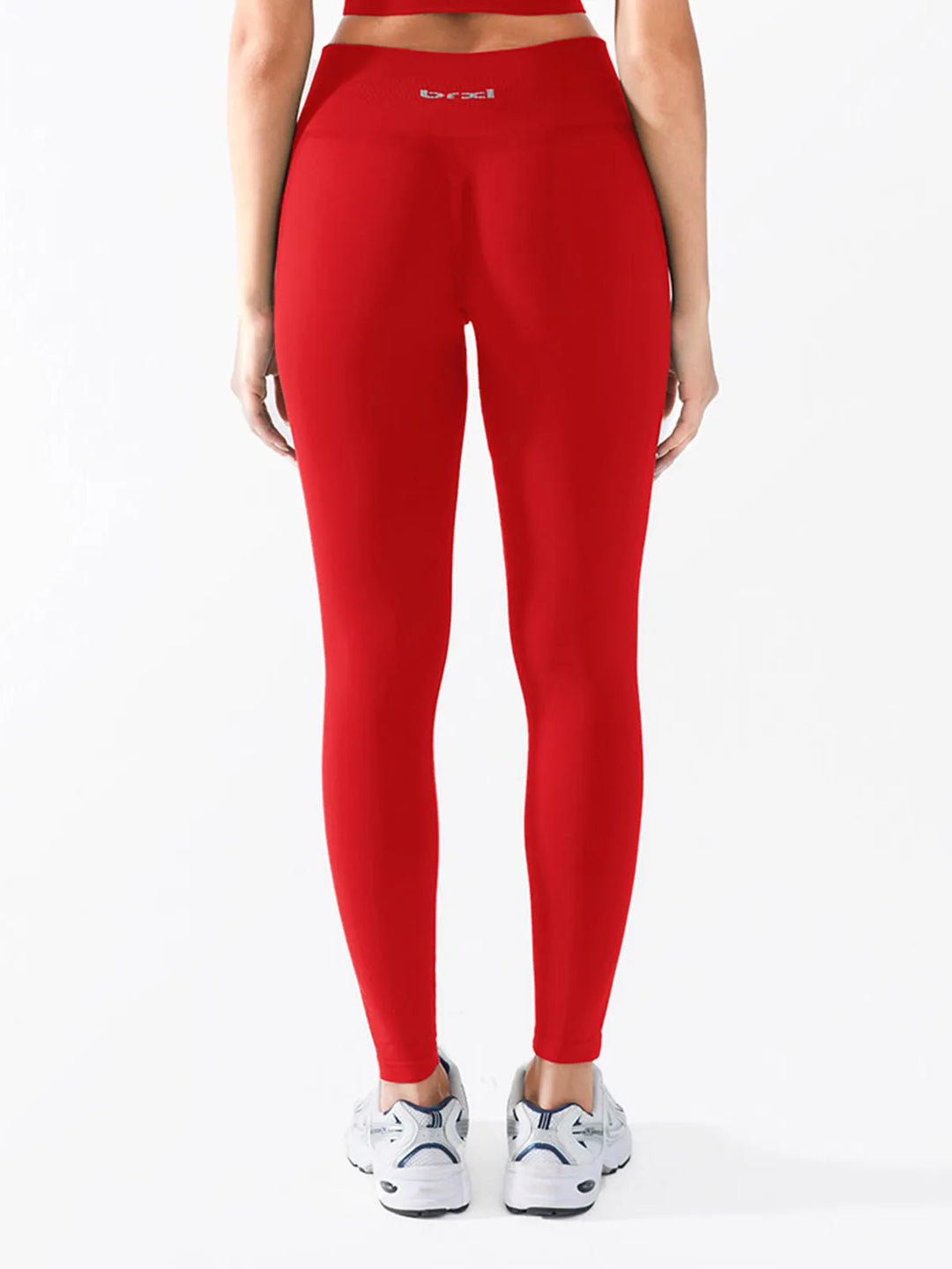 A model wearing a BRXL® B R X L™ Scrunch Butt Lifting Tummy Control High Waist Workout Leggings