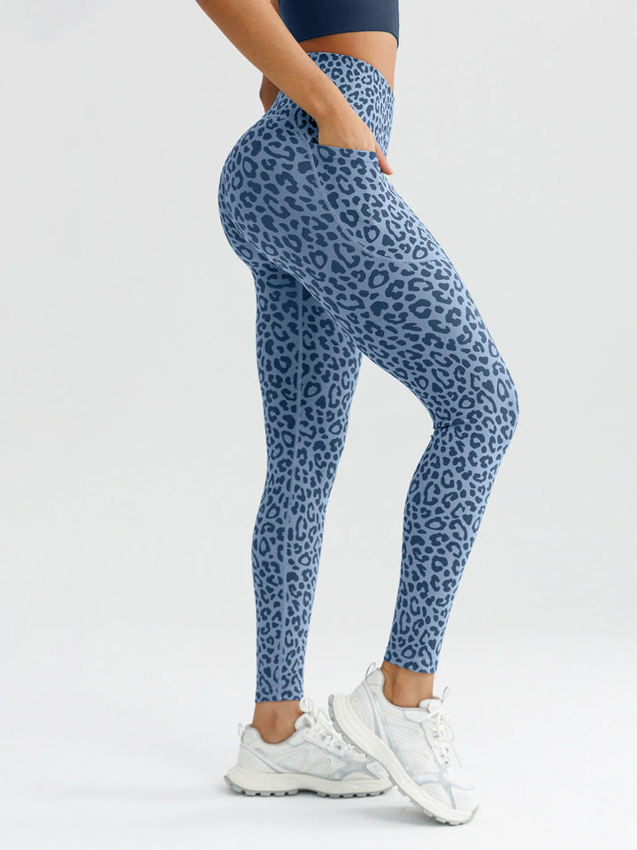 A model wearing a BRXL® B R X L™ Seamless High Waisted Butt-Lifting Leggings with Pockets