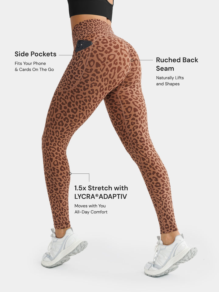 A model wearing a BRXL® B R X L™ Seamless High Waisted Butt-Lifting Leggings with Pockets