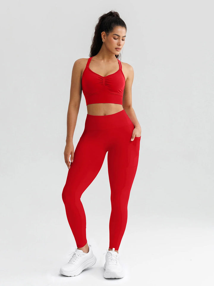 A model wearing a BRXL® B R X L® Seamless High Waisted Butt-Lifting Leggings with Pockets