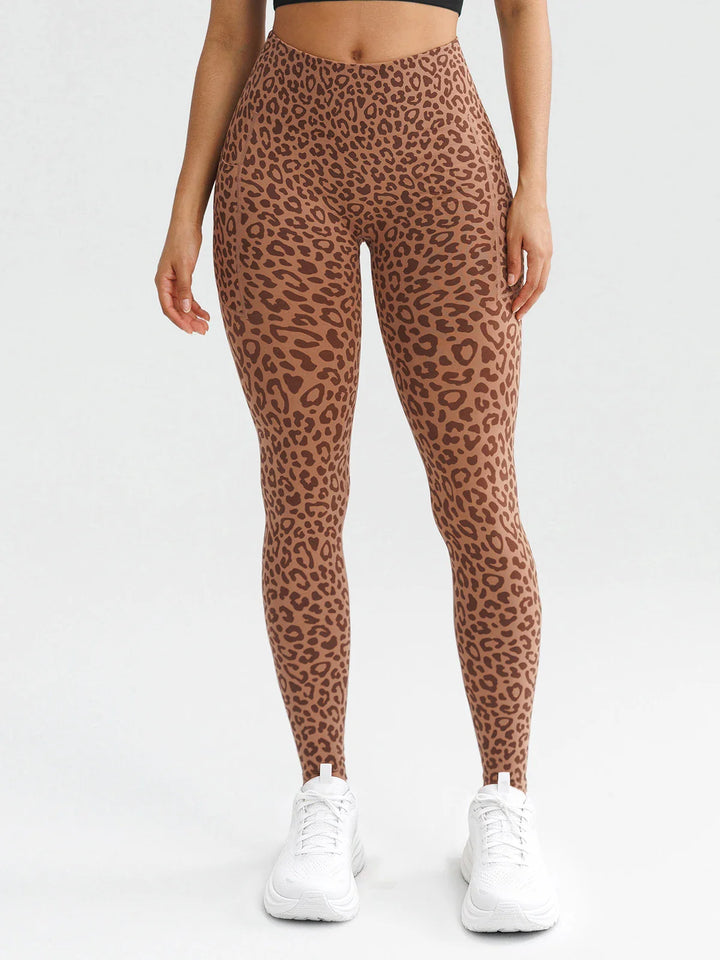 A model wearing a BRXL® B R X L® Seamless High Waisted Butt-Lifting Leggings with Pockets