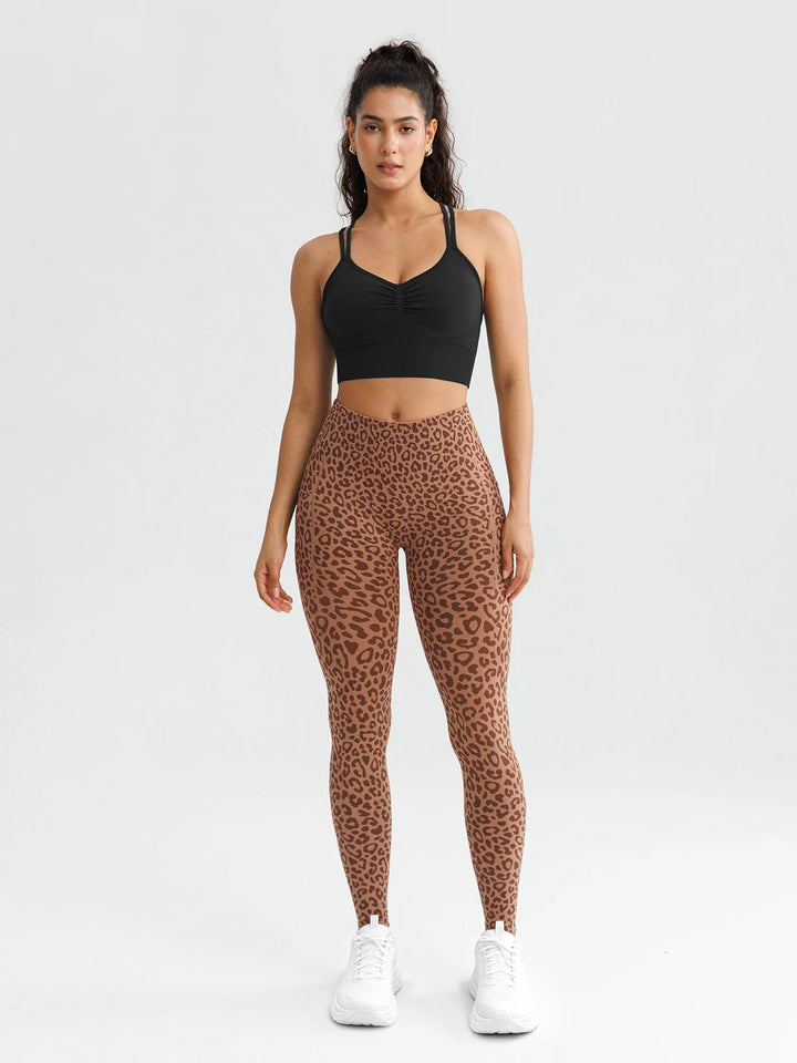 A model wearing a BRXL® B R X L® Seamless High Waisted Butt-Lifting Leggings with Pockets