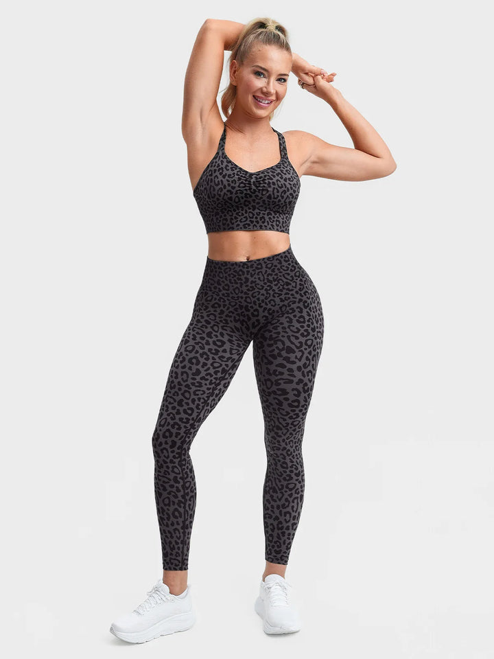 A model wearing a BRXL® B R X L®  Seamless Pro 2.0 High-Stretch LYCRA® High-Rise Sculpt Leggings
