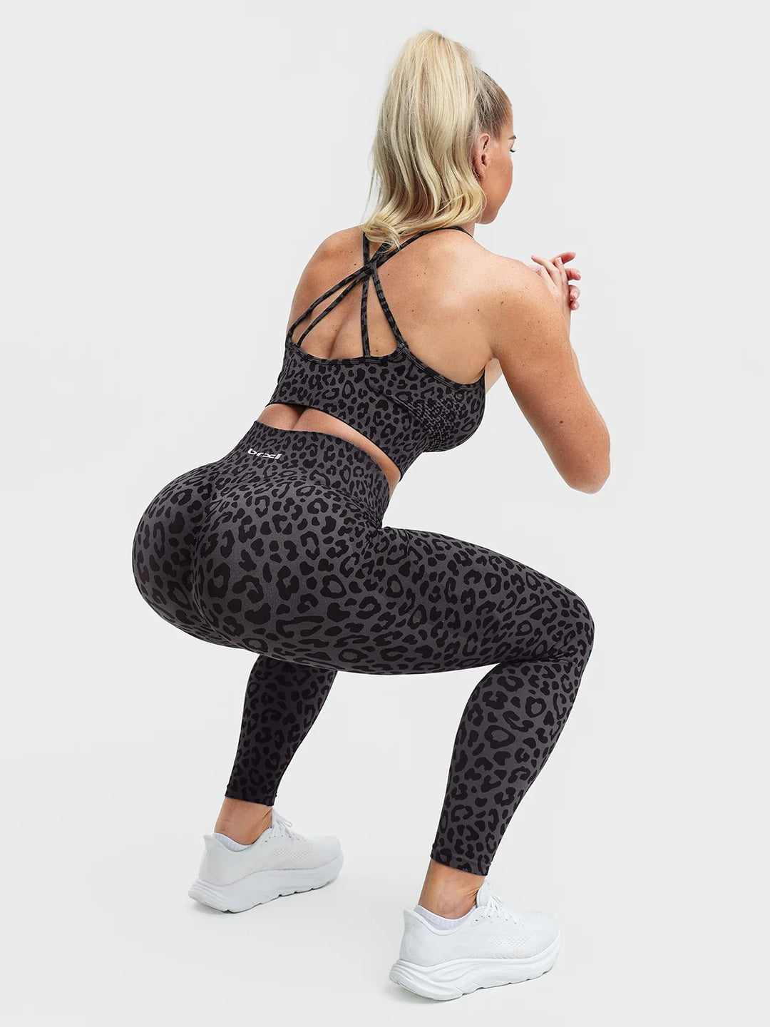A model wearing a BRXL® B R X L®  Seamless Pro 2.0 High-Stretch LYCRA® High-Rise Sculpt Leggings