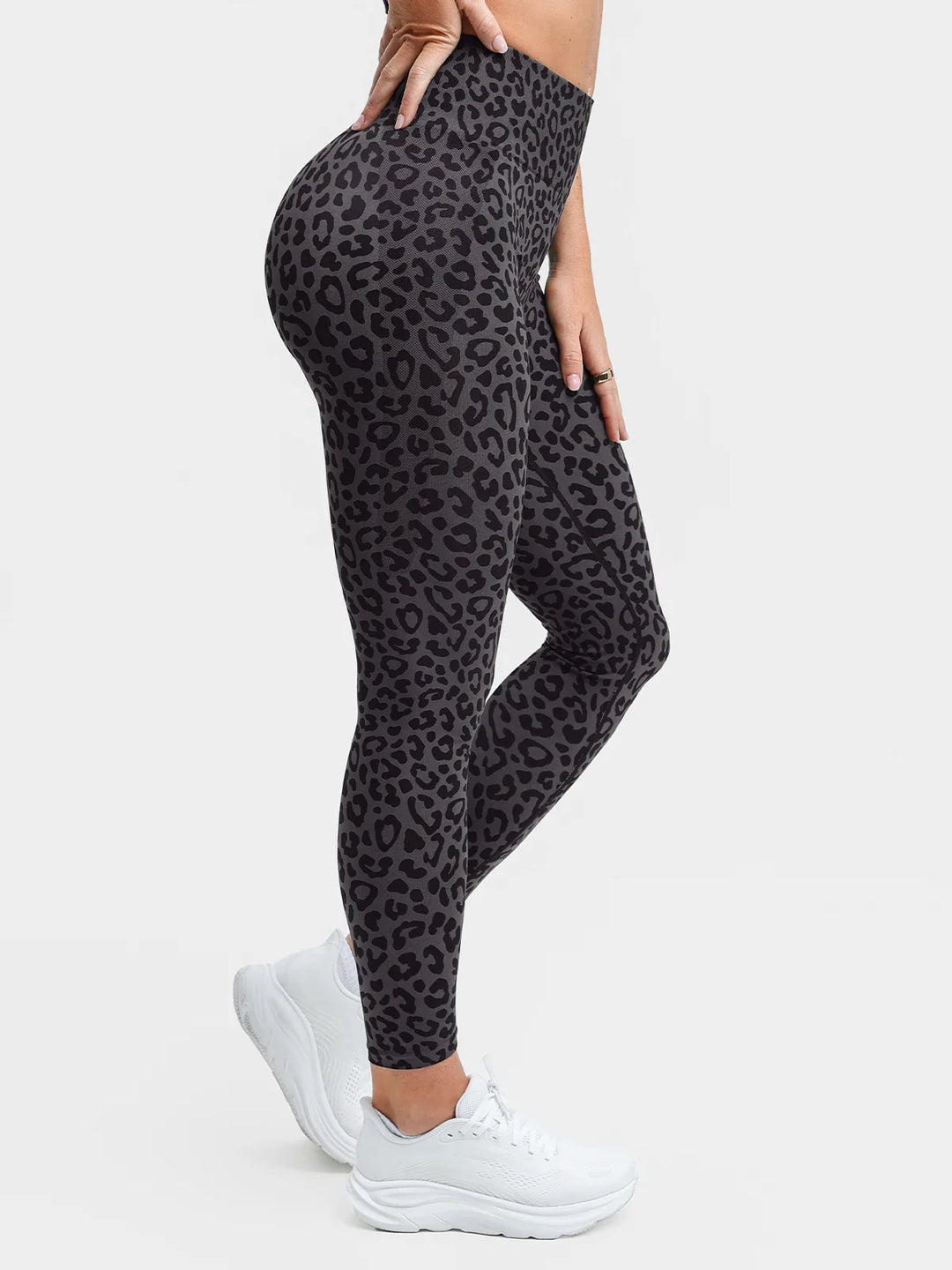 A model wearing a BRXL® B R X L®  Seamless Pro 2.0 High-Stretch LYCRA® High-Rise Sculpt Leggings