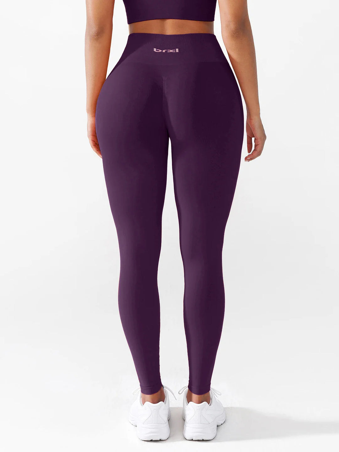 A model wearing a BRXL® B R X L®  Seamless Pro 2.0 High-Stretch LYCRA® High-Rise Sculpt Leggings