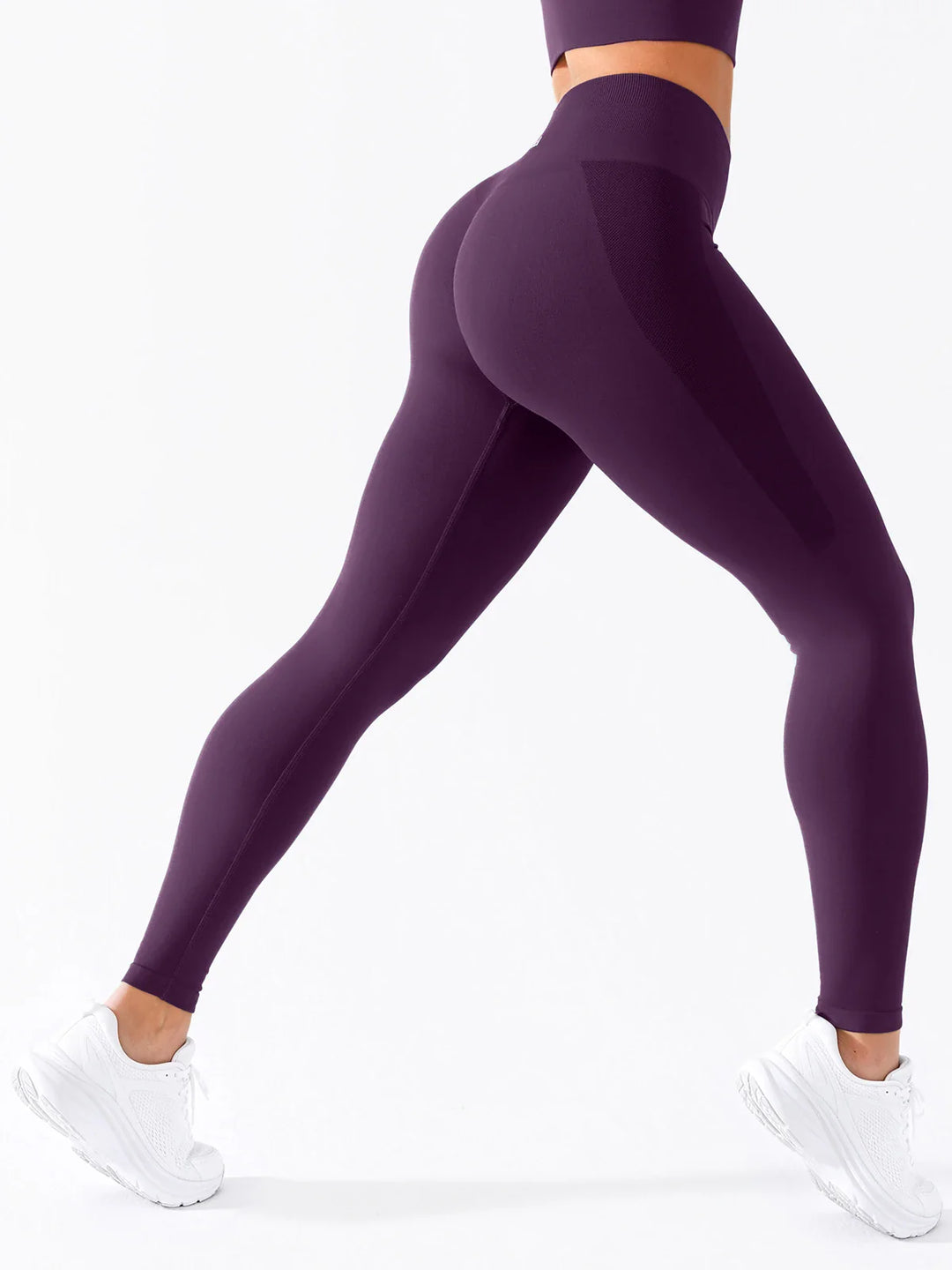 A model wearing a BRXL® B R X L®  Seamless Pro 2.0 High-Stretch LYCRA® High-Rise Sculpt Leggings
