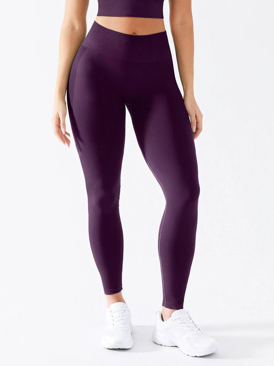 A model wearing a BRXL® B R X L®  Seamless Pro 2.0 High-Stretch LYCRA® High-Rise Sculpt Leggings