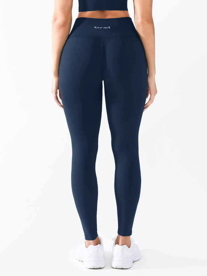 A model wearing a BRXL® B R X L®  Seamless Pro 2.0 High-Stretch LYCRA® High-Rise Sculpt Leggings