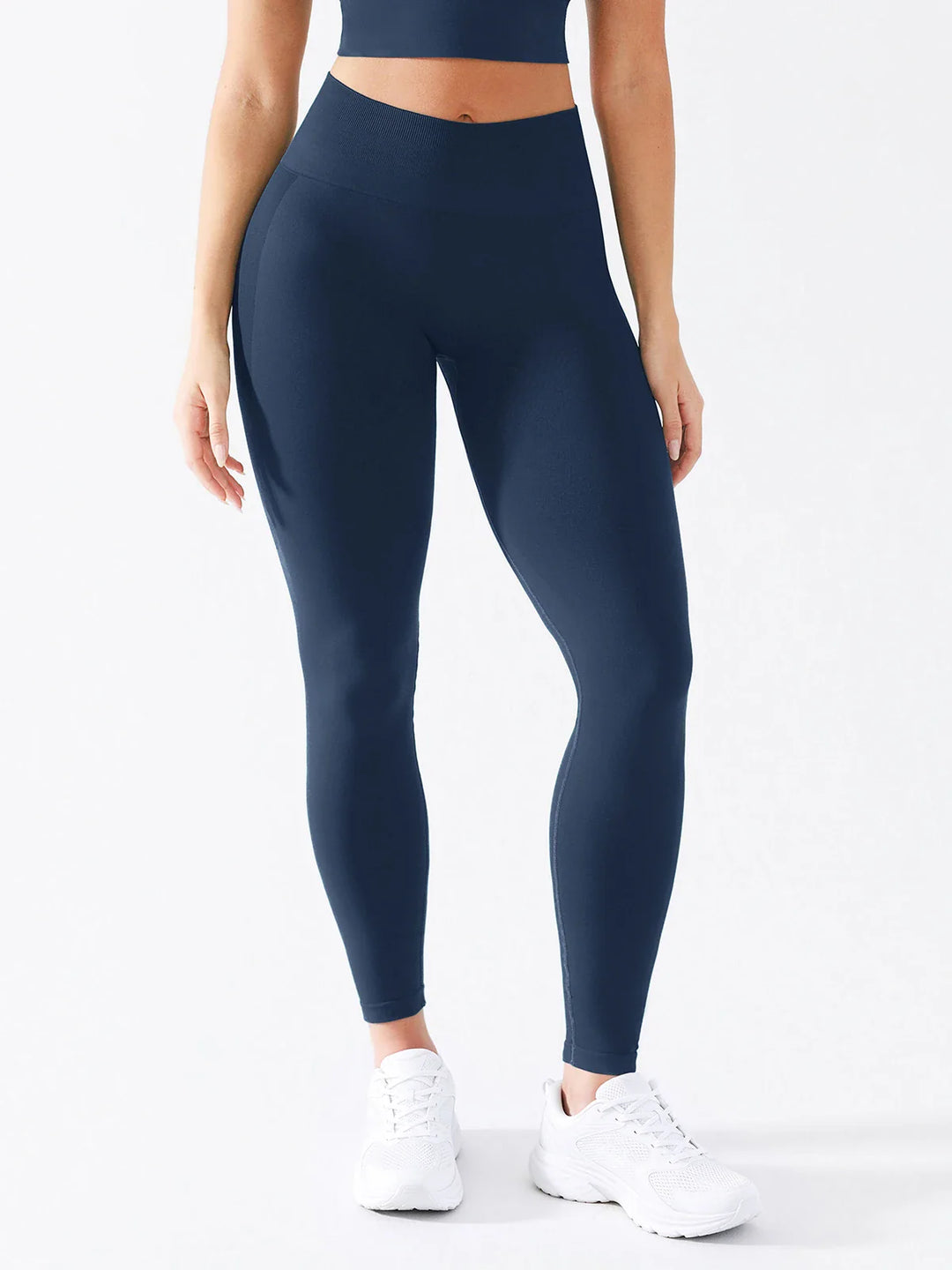 A model wearing a BRXL® B R X L®  Seamless Pro 2.0 High-Stretch LYCRA® High-Rise Sculpt Leggings