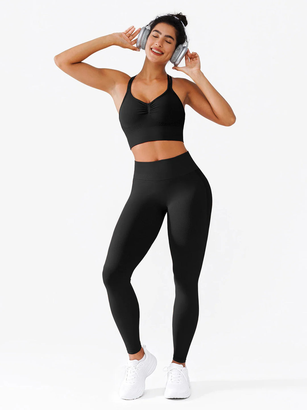 A model wearing a BRXL® B R X L®  Seamless Pro 2.0 High-Stretch LYCRA® High-Rise Sculpt Leggings