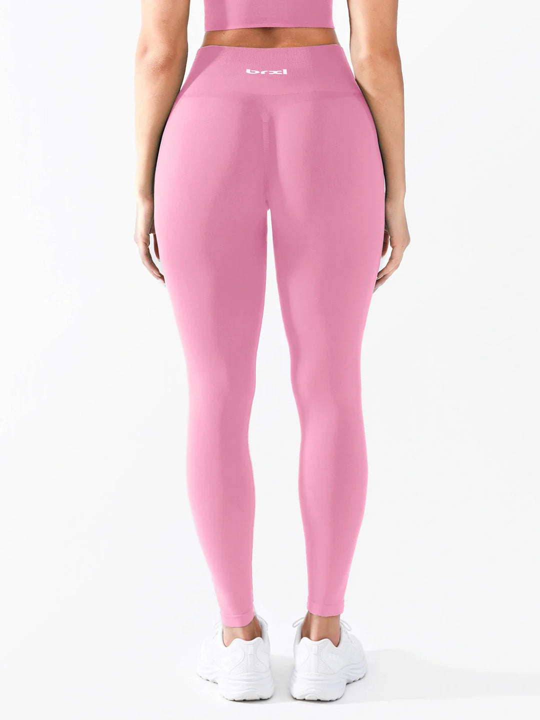 A model wearing a BRXL® B R X L®  Seamless Pro 2.0 High-Stretch LYCRA® High-Rise Sculpt Leggings