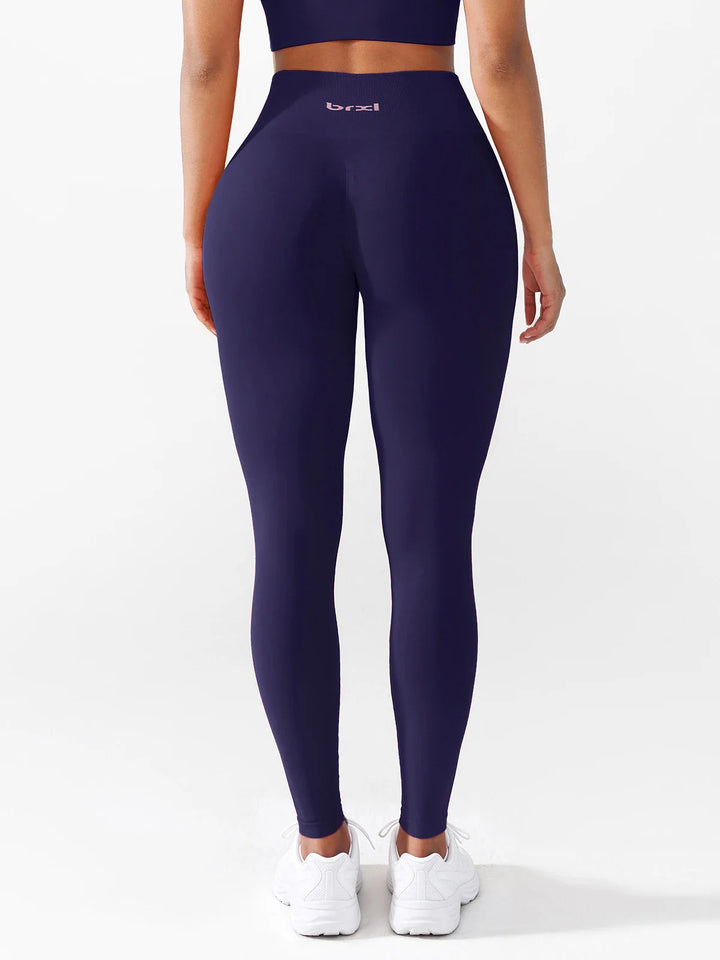 A model wearing a BRXL® B R X L®  Seamless Pro 2.0 High-Stretch LYCRA® High-Rise Sculpt Leggings