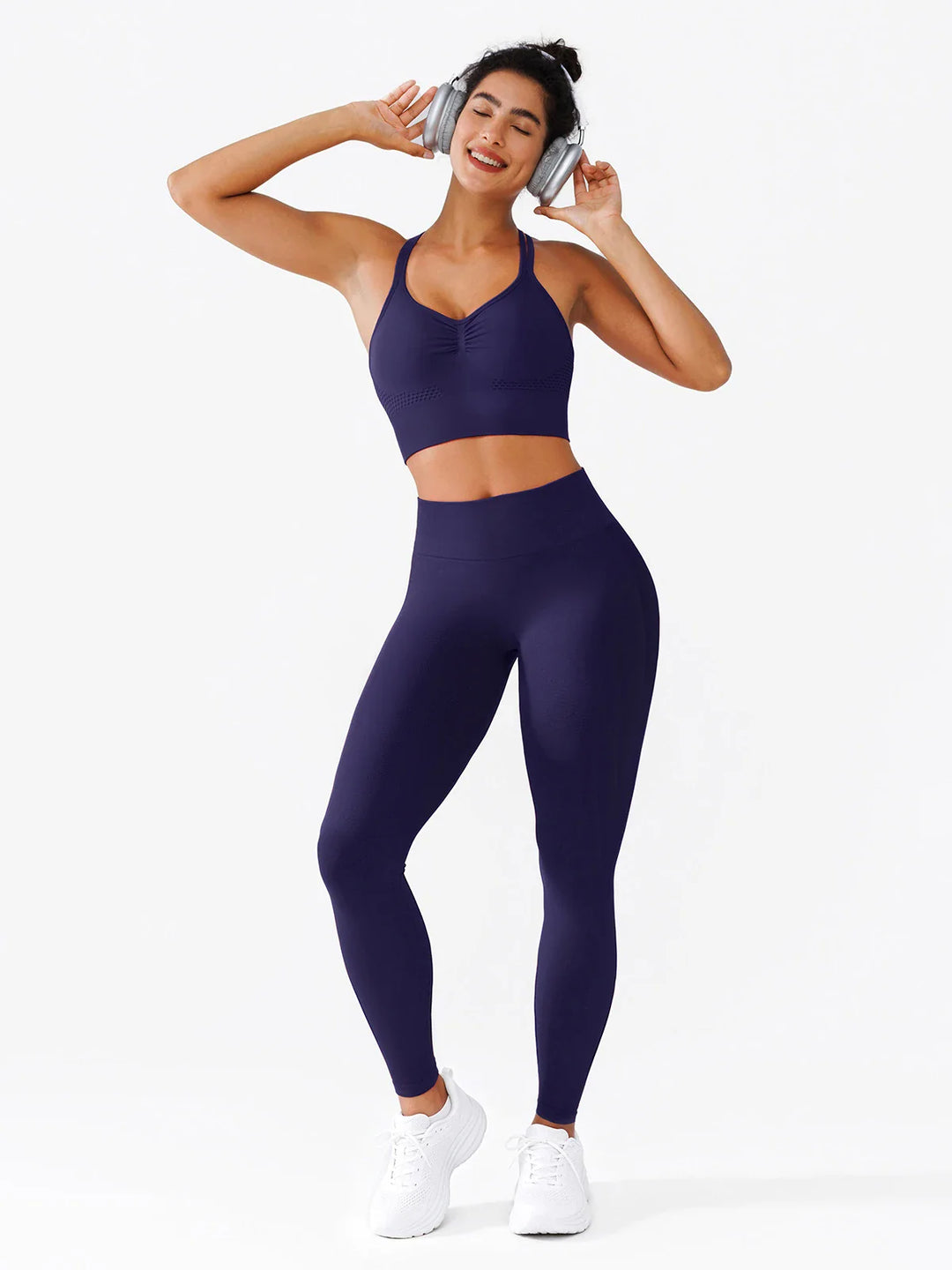 A model wearing a BRXL® B R X L®  Seamless Pro 2.0 High-Stretch LYCRA® High-Rise Sculpt Leggings