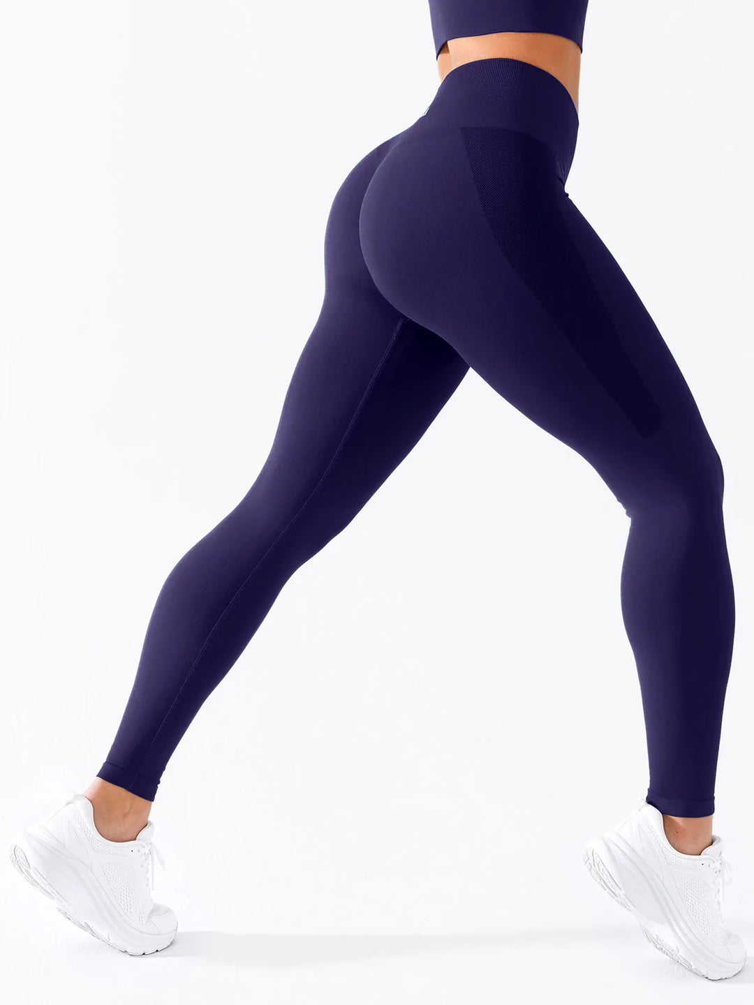 A model wearing a BRXL® B R X L®  Seamless Pro 2.0 High-Stretch LYCRA® High-Rise Sculpt Leggings