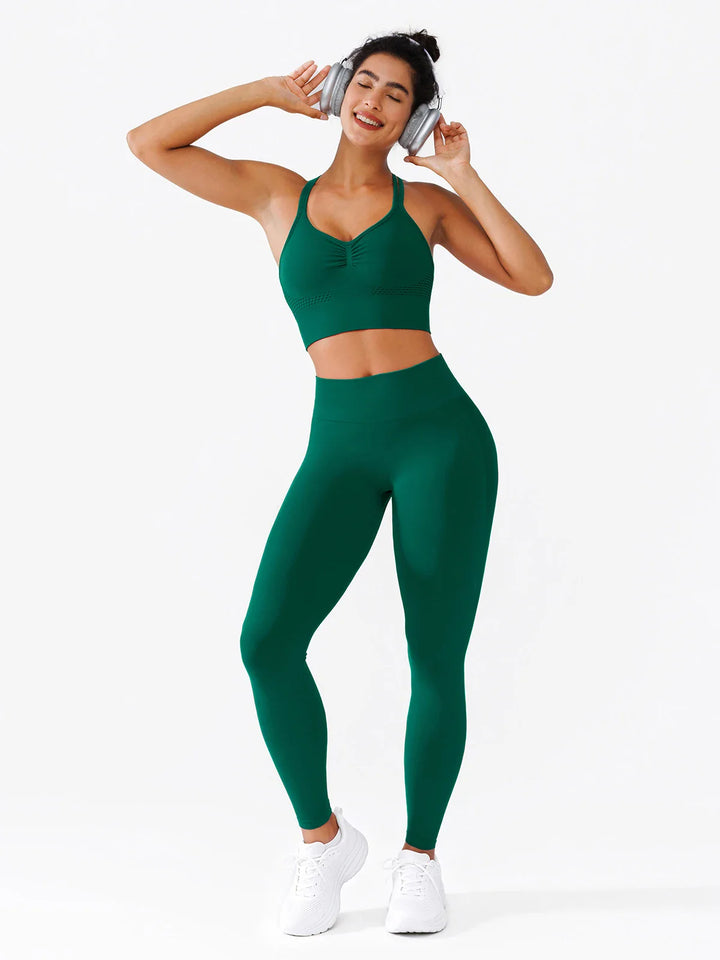 A model wearing a BRXL® B R X L®  Seamless Pro 2.0 High-Stretch LYCRA® High-Rise Sculpt Leggings