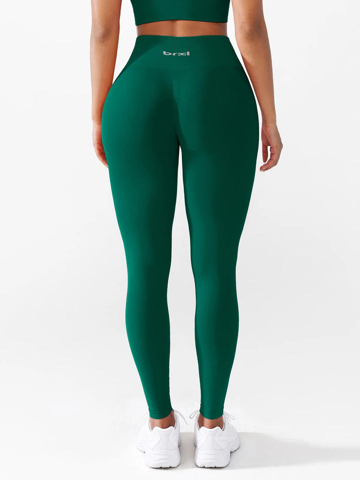 A model wearing a BRXL® B R X L®  Seamless Pro 2.0 High-Stretch LYCRA® High-Rise Sculpt Leggings