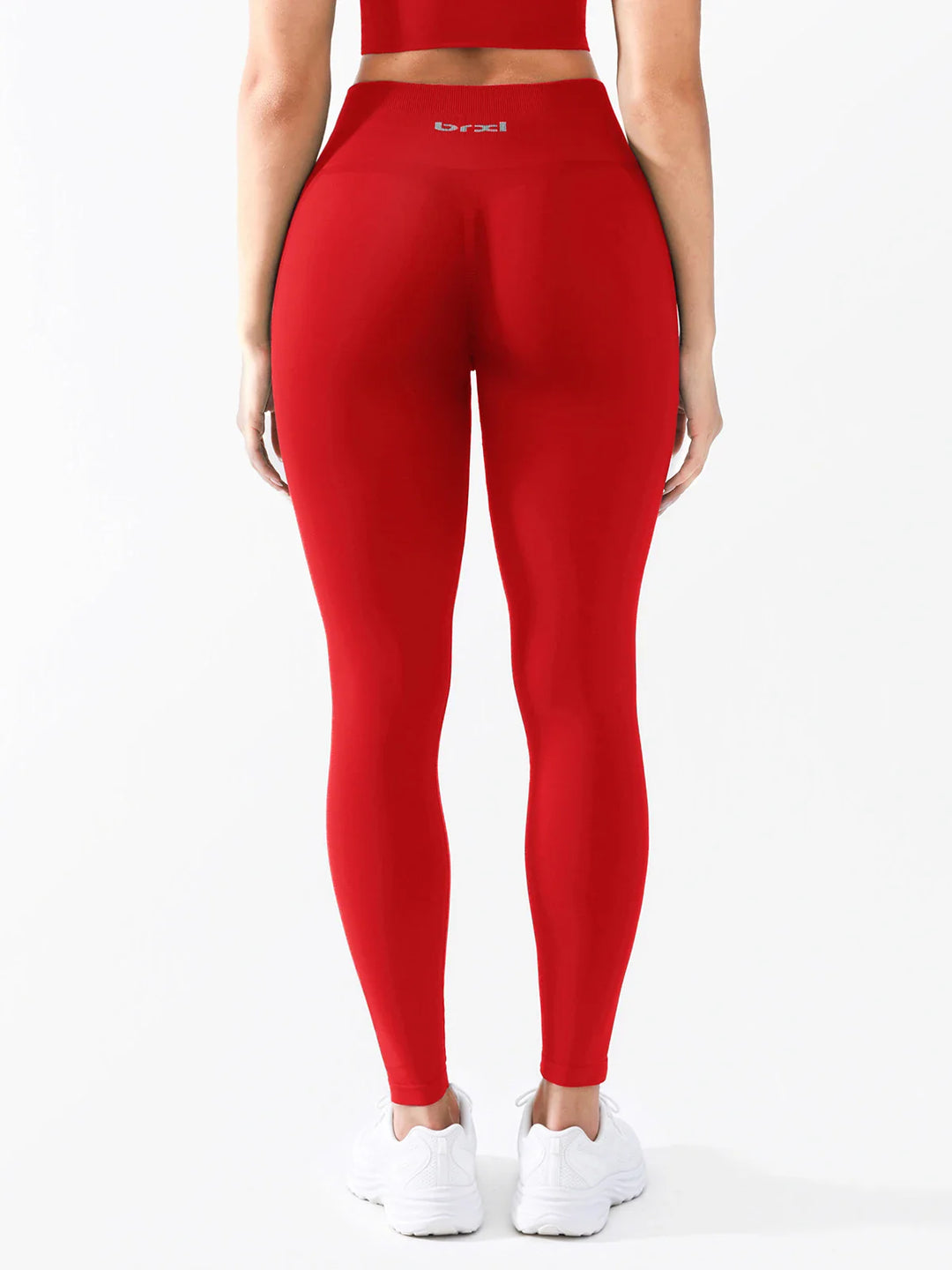 A model wearing a BRXL® B R X L®  Seamless Pro 2.0 High-Stretch LYCRA® High-Rise Sculpt Leggings