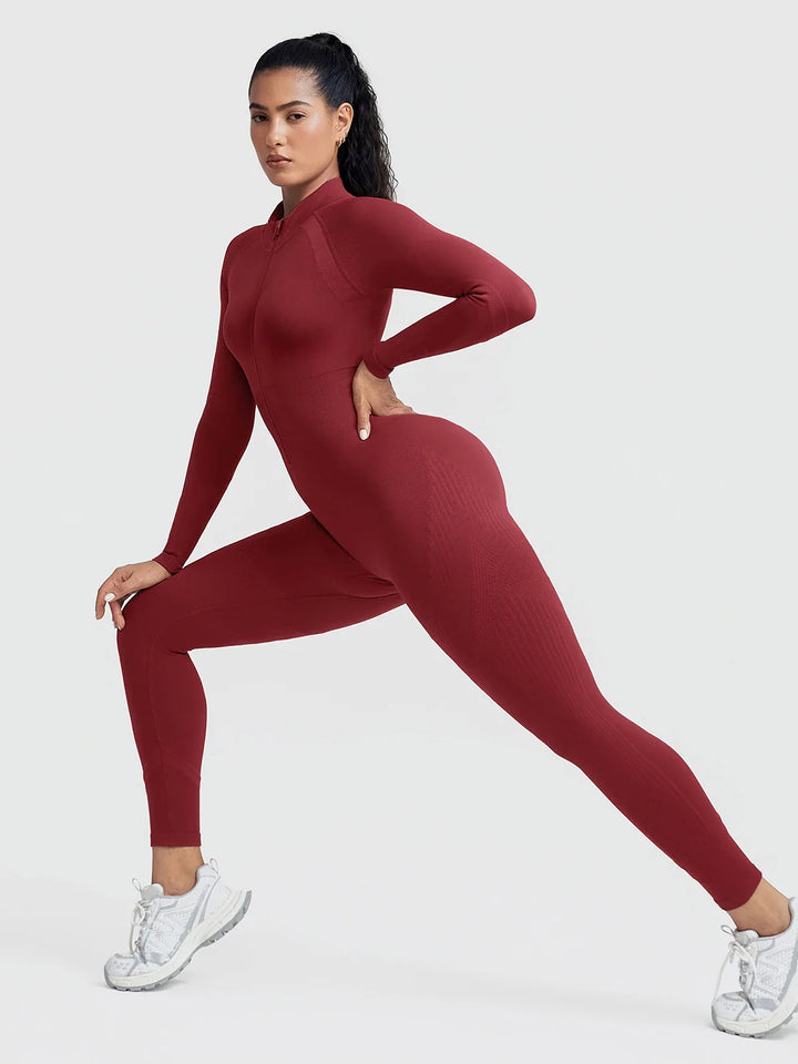 A model wearing a BRXL® BrxlGrit™ Long Sleeve Sculpting Contrast Workout Zip Up Jumpsuit