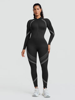 A model wearing a BRXL® BrxlGrit™ Long Sleeve Sculpting Contrast Workout Zip Up Jumpsuit Black / XS