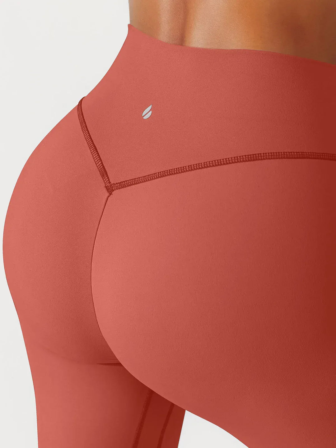 A model wearing a BRXL® BrxlGrit™ Scrunch High Rise Gym Leggings in