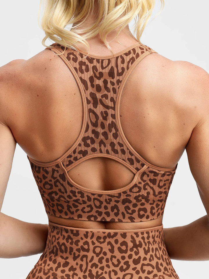 A model wearing a BRXL® BrxlGrit™ Seamless Front Zip Racerback Medium Impact Sports Bra