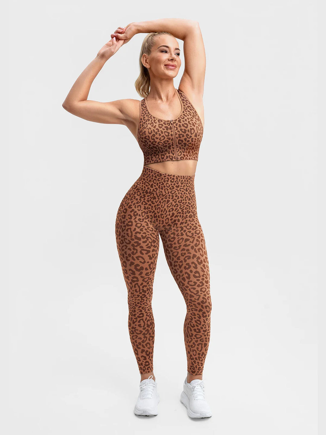 A model wearing a BRXL® BrxlGrit™ Seamless Front Zip Racerback Medium Impact Sports Bra