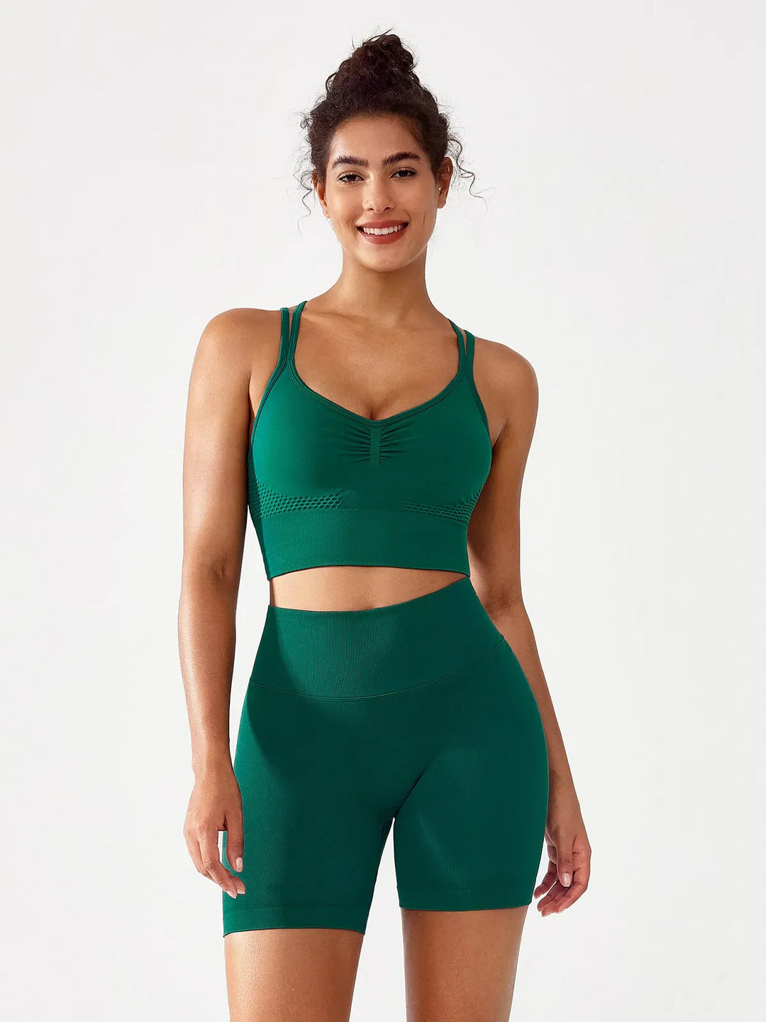 A model wearing a BRXL® BrxlGrit™ Seamless Scrunch Butt Workout Shorts in