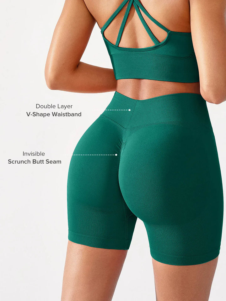 A model wearing a BRXL® BrxlGrit™ Seamless Scrunch Butt Workout Shorts