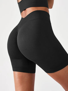A model wearing a BRXL® BrxlGrit™ Seamless Scrunch Butt Workout Shorts Black / S