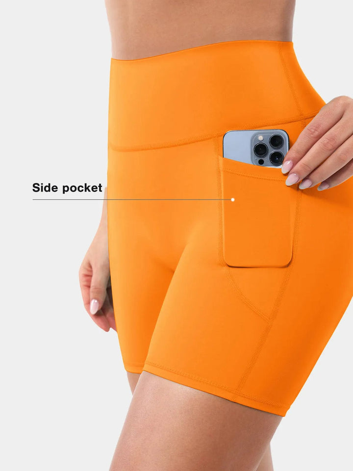 A model wearing a BRXL® BrxlZero™ Biker Shorts With Pockets in