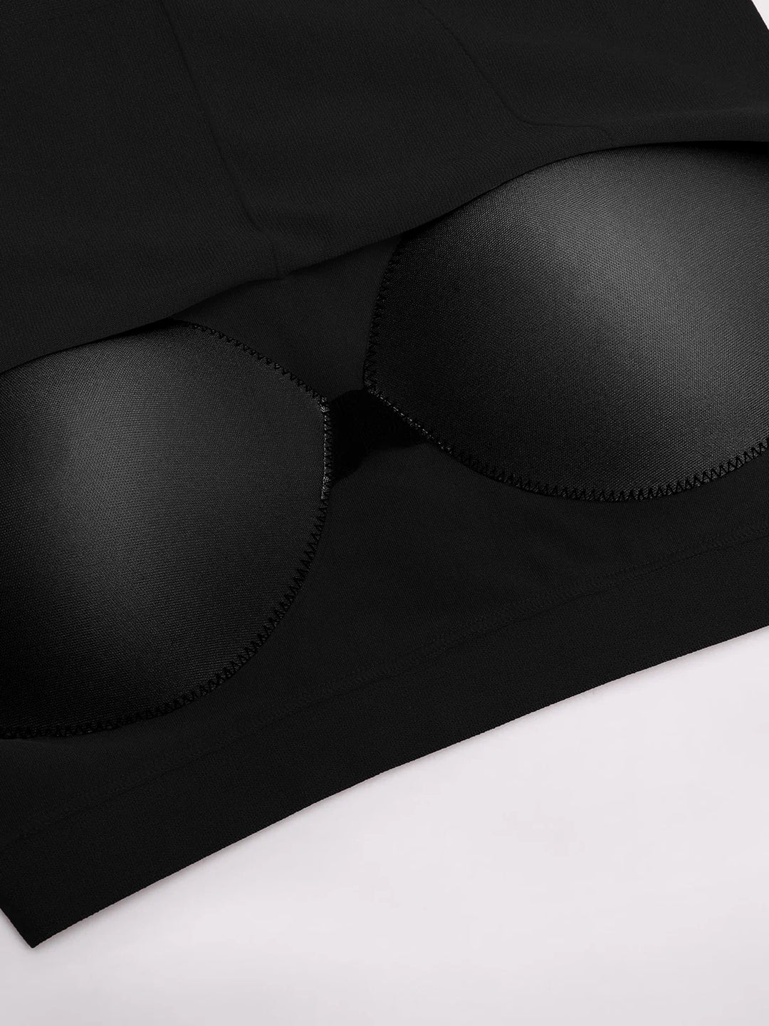 A model wearing a BRXL® BrxlZero® Halter Neck Sculpt Seamless Flare Jumpsuit
