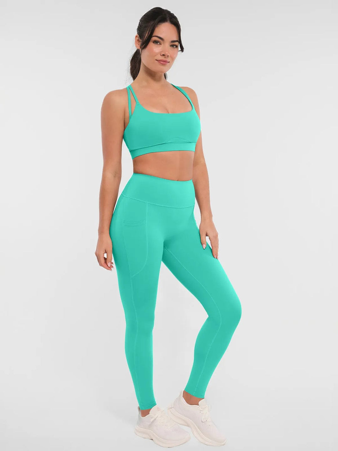 A model wearing a BRXL® BrxlZero™ High Rise Buttery Soft Yoga Leggings in