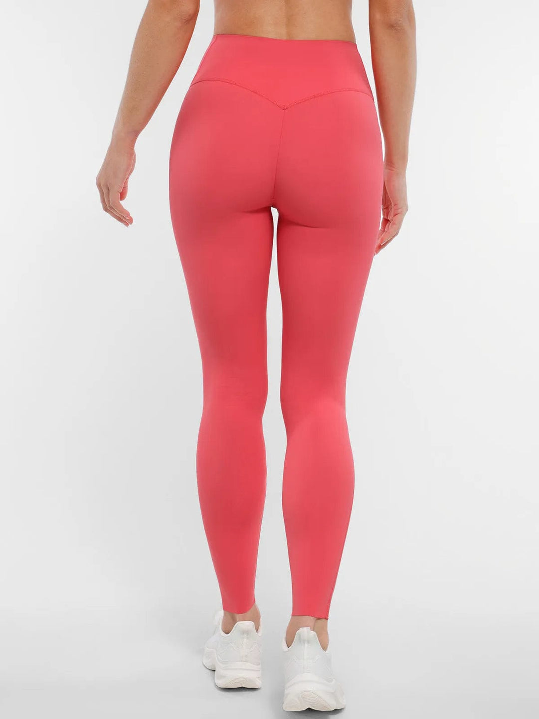 A model wearing a BRXL® BrxlZero™ High Rise Buttery Soft Yoga Leggings in